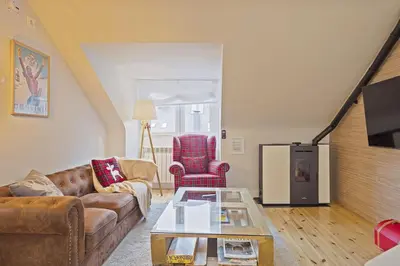 Una televisión o centro de entretenimiento en Luderna - Apartamento Era Aigueta