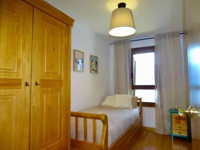 Cama o camas de una habitación en Apartamento en Cerler con vistas. Edif Aigualluts