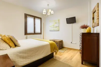 Cama o camas de una habitación en Alojamiento Las Guixas Villanua