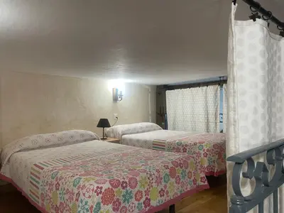 Cama o camas de una habitación en Casa Rural 