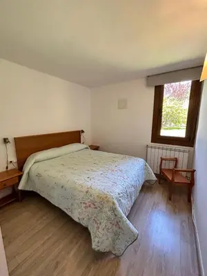 Cama o camas de una habitación en Apartamento con jardín en Cerler