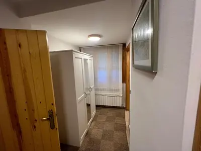 Una televisión o centro de entretenimiento en Acogedor Apartamento de Montaña