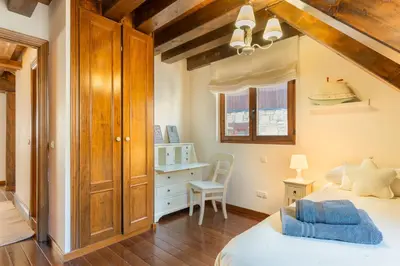 Cama o camas de una habitación en M1 eraclau - Era Candèla con garage y WiFi en Vielha