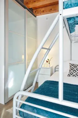 Cama o camas de una habitación en Val Arties 3 by FeelFree Rentals