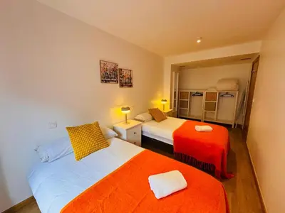 Cama o camas de una habitación en Magnifico alojamiento en el corazón de la ciudad Y CON GARAJE INCLUIDO