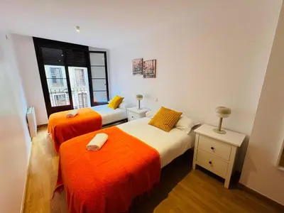 Cama o camas de una habitación en Magnifico alojamiento en el corazón de la ciudad Y CON GARAJE INCLUIDO