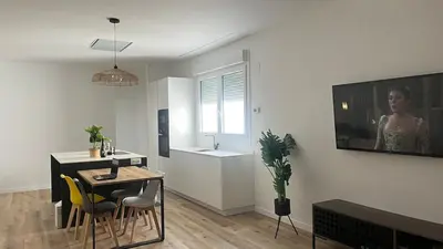 Una televisión o centro de entretenimiento en Apartamento en el centro de Pamplona