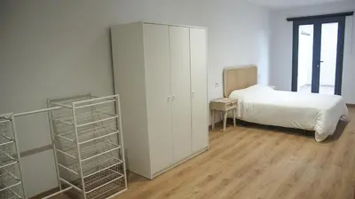 Cama o camas de una habitación en Cal Perot Apartamento turístico en Les Borges Blanques