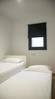 Cama o camas de una habitación en Cal Perot Apartamento turístico en Les Borges Blanques