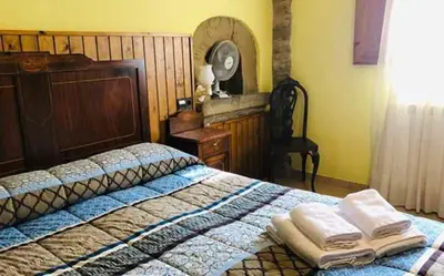 Cama o camas de una habitación en Casa Rural LES PLETES
