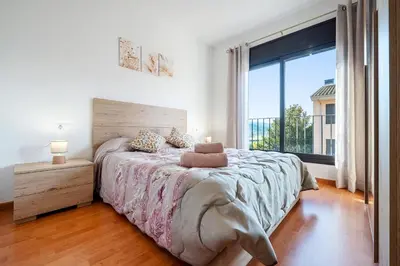 Cama o camas de una habitación en Apartamentos de Miguel