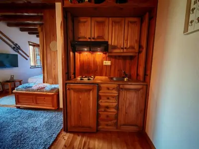 Una cocina o zona de cocina en Calideza máxima- Chimenea, balcón y jardín - Cosmos 2