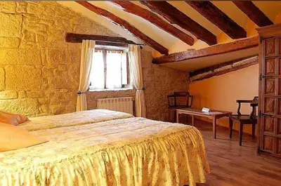 Cama o camas de una habitación en La Casa de las Monjas