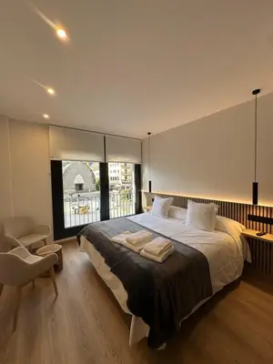 Cama o camas de una habitación en El tossalet Hotel - Apartament