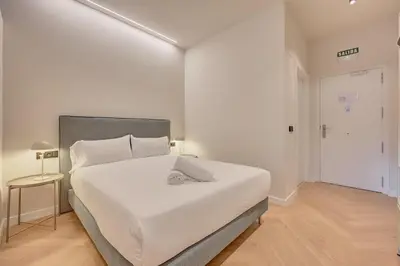Cama o camas de una habitación en Parque central A by Clabao