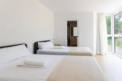 Cama o camas de una habitación en Las casitas de mache - LAGOSSA
