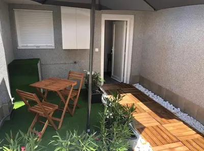 Zona de estar de Apartamento con Jardin y Garaje