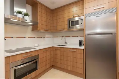 Una cocina o zona de cocina en Cota de la marmota by CARDI Suites