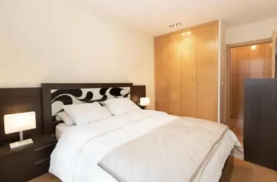Cama o camas de una habitación en Cota de la marmota by CARDI Suites