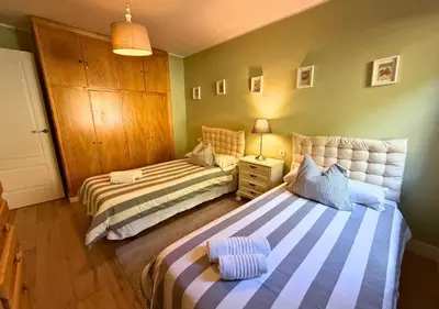 Cama o camas de una habitación en Ático Peña Blanca: Magníficas Vistas al Valle