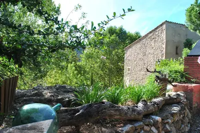 Jardín al aire libre en Masia El Riscle - Moli Del Pont