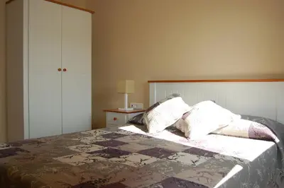 Cama o camas de una habitación en Apartament Escaladei