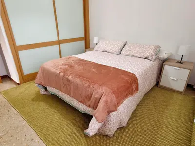 Cama o camas de una habitación en La Muralla de los Sitios by Alogest
