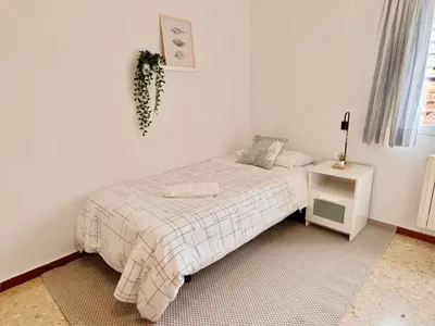 Cama o camas de una habitación en La Muralla de los Sitios by Alogest