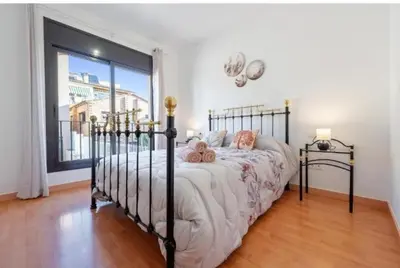 Cama o camas de una habitación en Apartamentos de Ángel