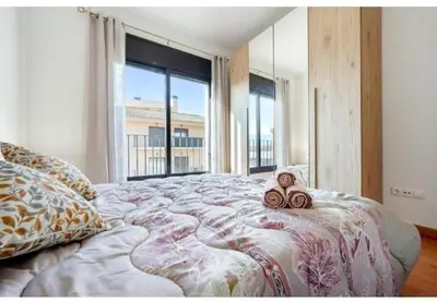 Cama o camas de una habitación en Apartamentos de Miguel
