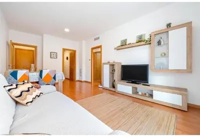 Una televisión o centro de entretenimiento en Apartamentos de Miguel