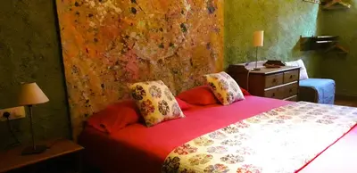 Cama o camas de una habitación en Masia El Canalot - Molí Del Pont