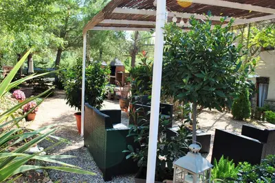 Jardín al aire libre en Masia El Canalot - Molí Del Pont