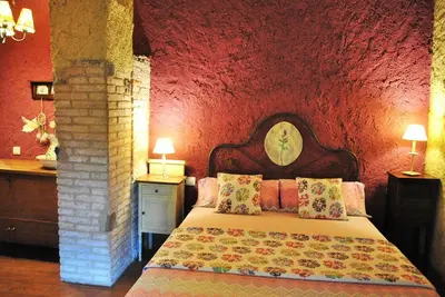 Cama o camas de una habitación en Masia El Canalot - Molí Del Pont