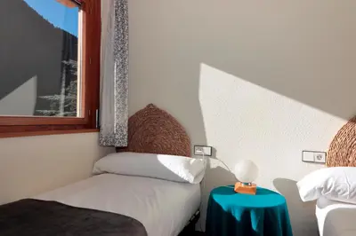 Cama o camas de una habitación en Apartarent 1500 - Apartamento Timonet