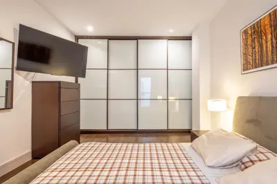 Cama o camas de una habitación en Luxurious apartment in the center of Zaragoza