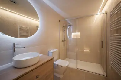 Un baño de Apartamentos Bombón Tudela