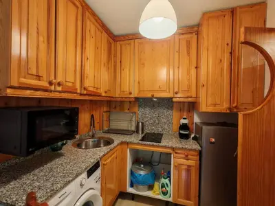 Una cocina o zona de cocina en Nórdico y acogedor- Confort con chimenea - Falcó 4