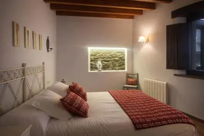 Cama o camas de una habitación en El Cau de l'Aina