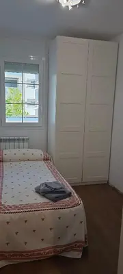 Cama o camas de una habitación en Apartamento en Huesca capital