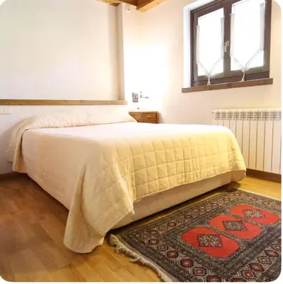 Cama o camas de una habitación en Bonito spartsmento a 5 minutos de Baqueira