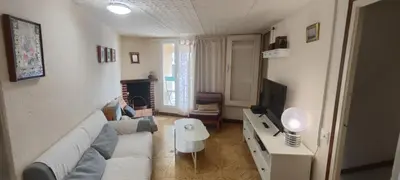 Una televisión o centro de entretenimiento en Cal Pataqué, house in Arnes