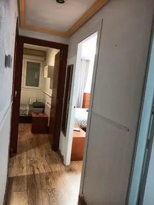 Cama o camas de una habitación en Apartamento en el centro encima de piscina Palafox