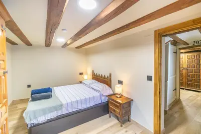 Cama o camas de una habitación en Acogedora casa rural para conocer Navarra