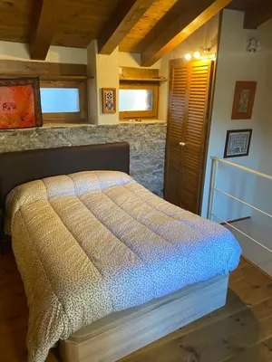 Cama o camas de una habitación en Casa Riveret