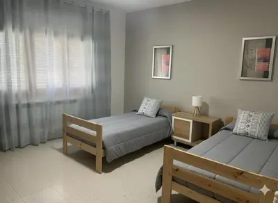 Cama o camas de una habitación en Manu Casa Rural II