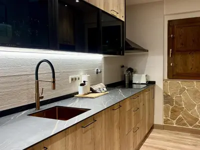 Una cocina o zona de cocina en Atico de lujo en el Pirineo