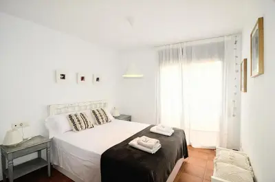 Cama o camas de una habitación en Apartaments la Rambla - L'Arrel - 4 persones