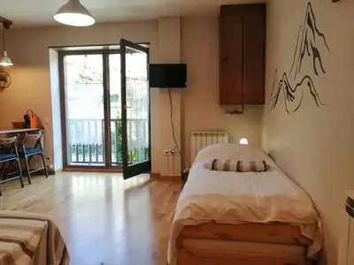Cama o camas de una habitación en Apartment Geräumiges Studio mit Balkon Erta 2 Vall de Boí by Interhome