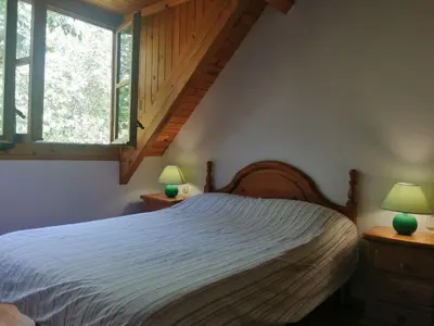 Cama o camas de una habitación en Apartment Geräumige Maisonette mit Kamin Isard 2 Vall de Boí by Interhome